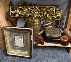 A group of mixed wood stone and other items.