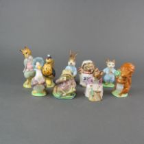 A group of nine Beswick Beatrix Potter character figures.