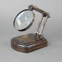 A small desk magnifying glass