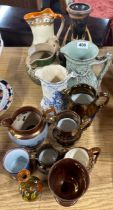 A group of mostly 19th century English lustre and other pottery items, tallest 24cm.