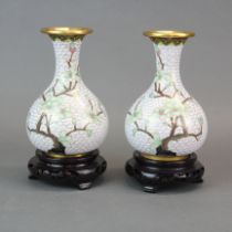 A pair of Chinese cloisonne vases on wooden stands, H. 19cm.