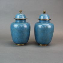 A pair of mid 20th century Chinese cloisonne jars and covers, H. 24cm. Slightly A/F.