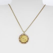 A full sovereign in a 9ct (stamped 9ct) mount, on a yellow metal chain.