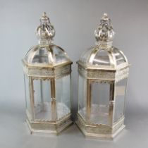 A pair of silvered metal garden lanterns, H. 64cm.