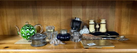 A Eastern bronze inkwell with a group of further inkwells and other items.