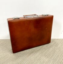 A vintage Spanish tan leather briefcase, size 42 x 30 x 8cm.