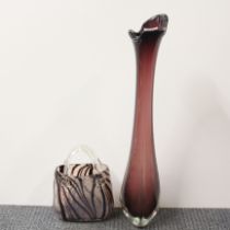 A 1970's glass vase, H. 63cm. Together with a glass shopping basket.