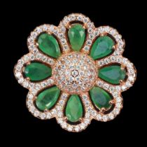 A rose gold on 925 silver flower shaped ring set with pear cut emeralds and white stones, (N.5).