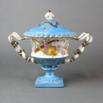 A continental porcelain urn and cover, W 23cm.