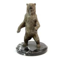 An interesting 925 silver overlayed figure of a standing polar bear, H. 22cm.