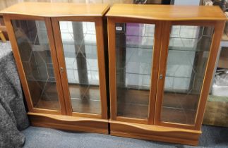 A pair of heavy quality light wood and glass shelved display cabinets, 108 x 75 x 33cm.