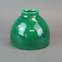 A Chinese green glazed porcelain brush washing pot, H. 10.5cm. D. 12cm. 6 character mark to base.