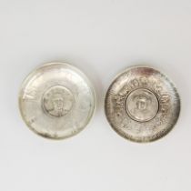 Two Chinese white metal dishes, Dia. 9cm.