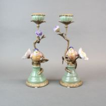 A pair of continental Ormulu mounted porcelain candlesticks, H. 30cm.
