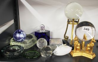 Two crystal balls on stands, Dia. 9.5cm. Together with a group of glass items.