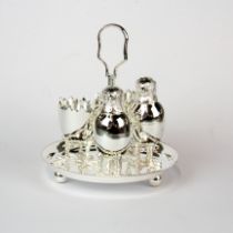An unusual silver plated chicken and egg cruet stand, H. 13cm.