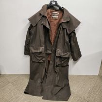 An Australian Driza-Bone waxed riding coat, size 7/XL, 115cm chest.