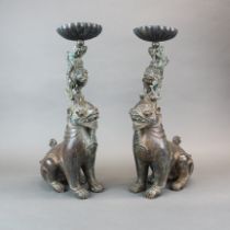 A pair of large bronze Indonesian pricket candle holders of mythical animals, H.47 cm.