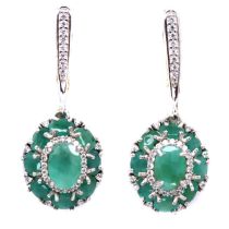 A pair of 925 silver drop earrings set with oval cut emeralds, L. 3.2cm.