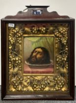 A 19th C. Russian double framed oil painted icon of John the Baptist, frame size 49 x 61cm.