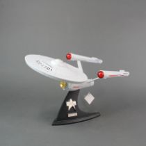 A 25th anniversary edition die-cast model of the Star-trek USS Enterprise, L. 38cm.