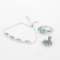 A 925 silver ring set with oval cut London blue topaz, size O. Together with an adjustable 925