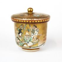 A finely decorated Japanese Kutani porcelain tea cup and cover, H. 7cm.