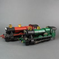 Two handmade metal steam Locomotives, L. 29cm.