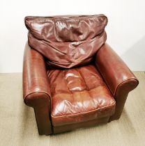 A leather armchair, H. 76cm.