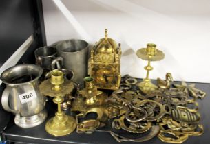 A group of horse brasses and other items.