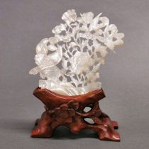 An early 20th century Chinese hand carved mother-of-pearl shell on hardwood stand, a beautiful