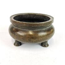 A mid 20th century Chinese cast bronze censer, dia. 13cm, D. 7cm.