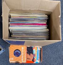 A quantity of LP and single records.