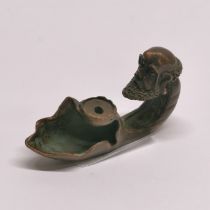 A small bronze incense holder, L. 7cm.