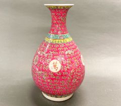 A Chinese hand painted porcelain vase, H. 38cm.