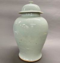 A very large 18th century Chinese celadon glazed jar and lid, H. 55cm.