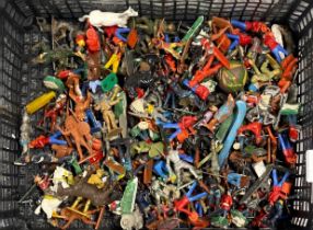 A collection of vintage plastic soldiers, etc.