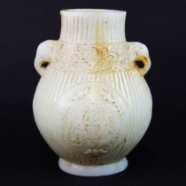 An interesting Chinese carved celadon jade vase, H. 19cm.