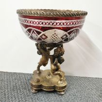 A Bohemian cut crystal bowl on bronze cherub stand, H. 33cm.