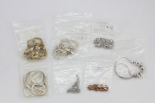 A quantity of 925 silver chains and a bracelet.