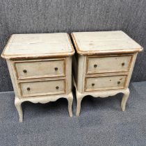 A pair of 1940's Italian painted pine, two drawer bedside cabinets, 65 x 48 x 40cm.
