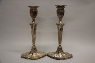 A pair of large weighted hallmarked silver candlesticks, H. 31cm.