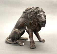 A cast bronze figure of a lion, H. 26cm.