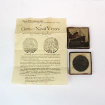 A boxed Lusitania commemorative medal.