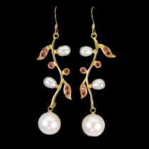 A gold on 925 silver drop earrings set with pearls and rubies, L. 6cm.