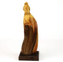 An elegant carved rootwood figure of the goddess Guanyin, H.30cm.