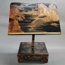A rare and unusual 19th century Chinese scholars lectern. Hand painted in gilt on a black laquered