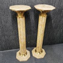 A pair of marble/stone and gilt metal plant stands, H. 100cm.