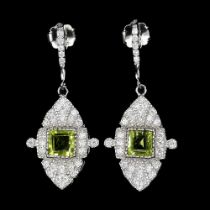 A pair of Art Deco style 925 silver drop earrings set with step cut peridots and white stones, L.