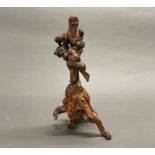 An early 20th century Chinese root wood carving, H. 30cm.